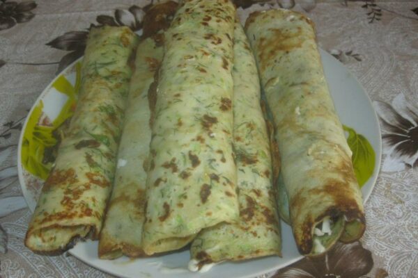 recepti smachni domashni kabachkovi mlinci z apetitnoyu nachinkoyu 690d402397b97 Рецепти: Смачні домашні кабачкові млинці з апетитною начинкою